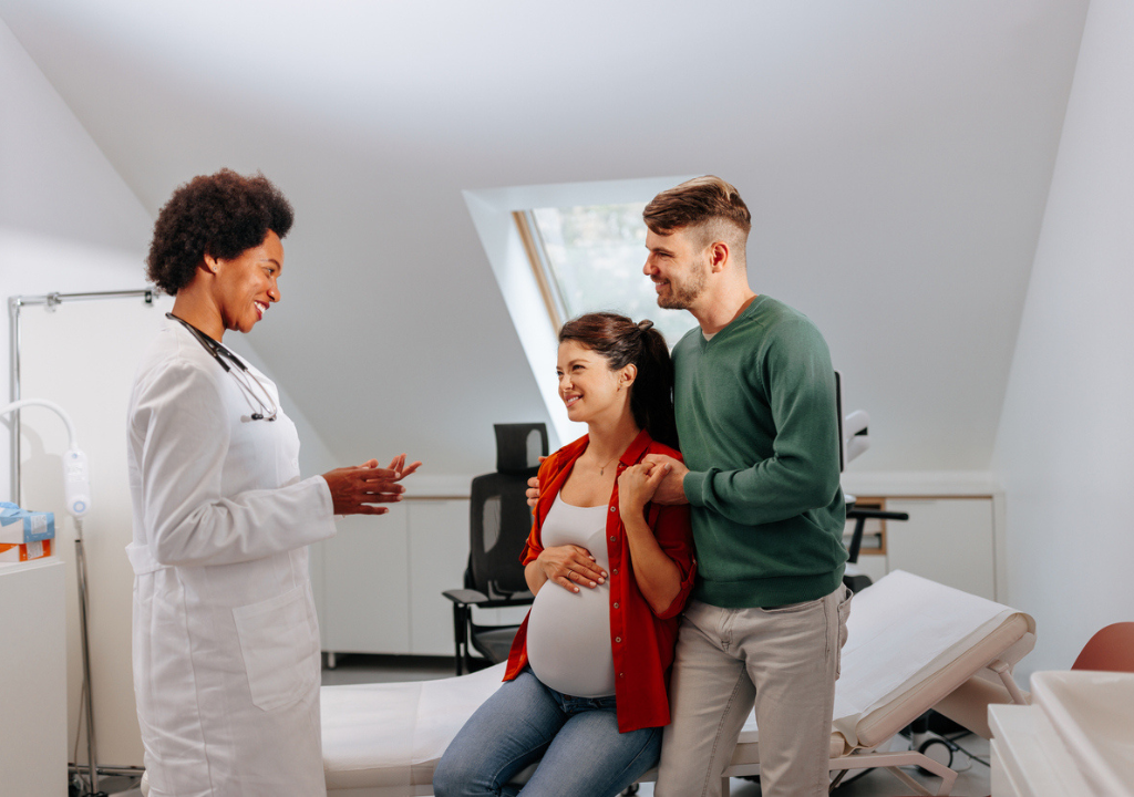 patient consulting with doctor in fertility clinic